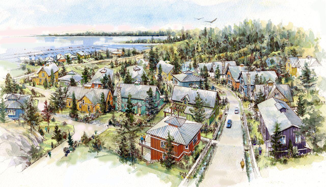 "View of Spirit Bay’s waterfront with cloudy sky and coastal homes in the background.