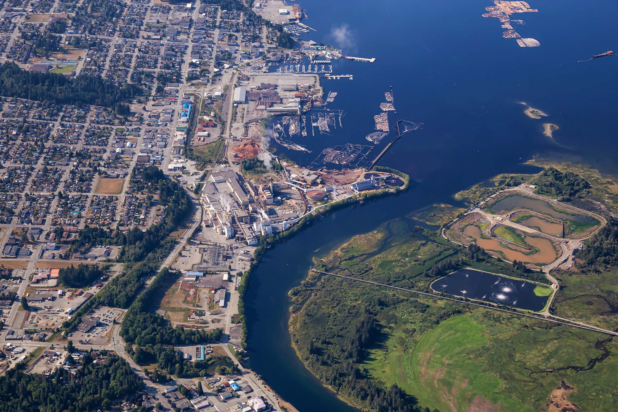 Aerial view of Port Alberni showing the Somass River meeting the Alberni Inlet